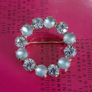 Vintage • Blue rhinestone circle pin brooch